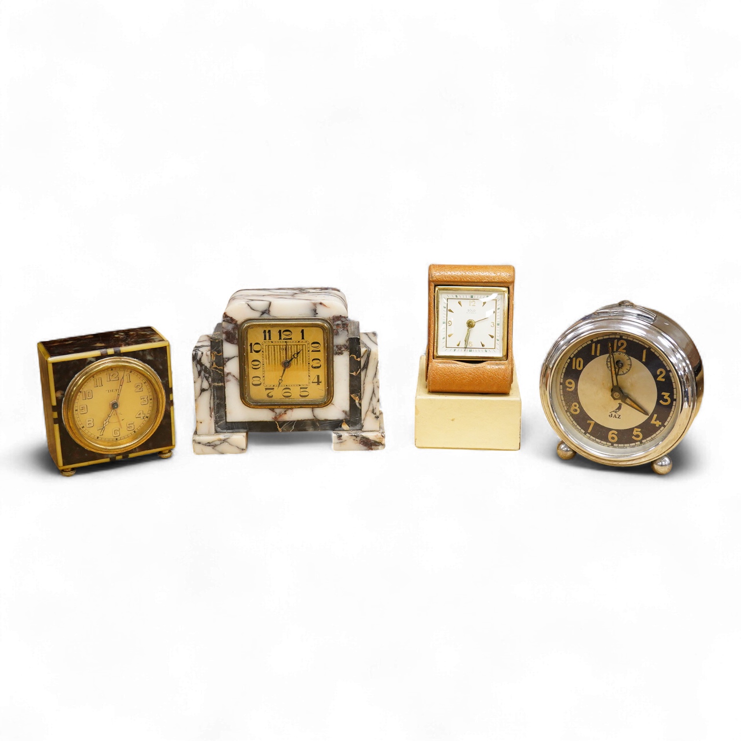 Four Art Deco timepieces, tallest 20cm